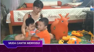 ibu muda cantik menyusui kakak adik breastfeeding tandem