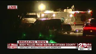 Officials investigating homicide after body recovered from water in Ottawa County