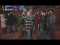 People withstand the cold for 2023 Kegs Eggs in LODO