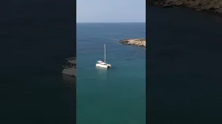 Hiding from strong winds at Faragas Bay on Paros #sailingfamily #sailinggreece #catamaran