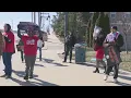 Local USPS letter carriers rally for fair contracts ahead of negotiations