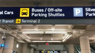 Exiting the tram at Terminal 1 MSP and walking to the off-Site Shuttle pickup area