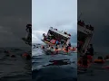 The ferry sinks fast after the collision—tilting, groaning, vanishing beneath the waves.