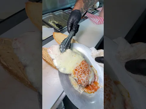 Would you in try this CHEESY VODKA CHICKEN PARM HERO? #chickenparm #foody #foodchallenge