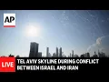 Download Lagu LIVE: Tel Aviv skyline during conflict between Israel and Iran