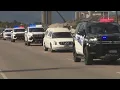 Procession escorts fallen parole officer home to Pueblo