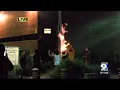 Protesters ignite flag in front county jail for the second time this week