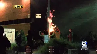 Protesters ignite flag in front county jail for the second time this week