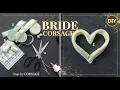 Lagu Maak een lintbloemcorsage voor de bruid