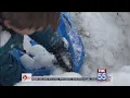 Fort Wayne kids and parents enjoy the first big snowfall of the season