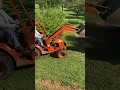 Lazy Man s way to trim overgrown shrubs Toro walk mower and Allmand TLB 325 backhoe loader