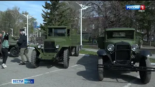 Колонна автомобилей Победы выстроилась сегодня у главого корпуса Омского технического университета