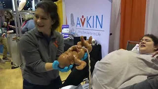 avkin demonstrates wearable avbirth birthing simulator at imsh 2023