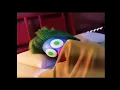 Blue cartoon with green hair getting excited on bed trending meme template