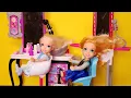 At the Salon Elsa and Anna toddlers - haircut