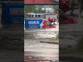 Van gets caught in street flooding in Cranston Rhode Island