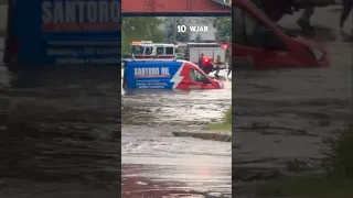 Van gets caught in street flooding in Cranston Rhode Island