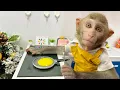 Monkey Baby Bim Bim go to the supermarket to buy kitchen utensils and eats eggs with puppy