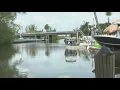 Dead body found in Dania Beach canal police say