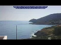 The entrance of Gavrio port Old lighthouse view