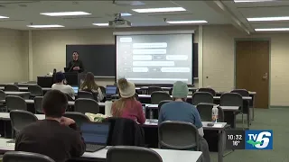 NMU students learn financial tips in interactive game