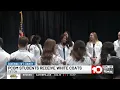 Nearly 100 future physicians receive white coats