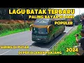 Download Lagu Lagu Batak terbaru paling bayak di cari sering di putar di perjalanan panjang bikin hati tenang