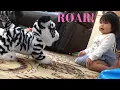 Chloe Playing FurReal Roarin Tyler The Playful Tiger Toy