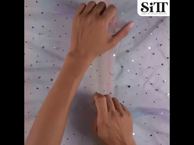 ผ้าตาข่ายลายดาวไล่สี