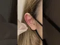 Small heart inside Ear tattoo design