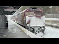 MBTA Kingston line inbound 6026 leaving Halifax in the snow with a snow covered 1028 trailing