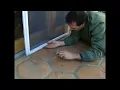 Putting a Sliding Screen Door in Track
