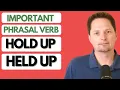 PHRASAL VERB HOLD UP HELD UP SOUND MORE AMERICAN ENGLISH AMERICAN PRONUNCIATION