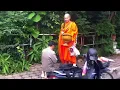 Thai monk blessing in street