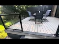 Beautiful Trex Deck with Glass railing and privacy screen