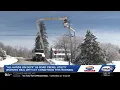 Power crews ready for outages in New Hampshire as freezing rain coats trees power lines