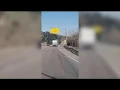 shows a semitrailer out of control in mountains ahead of fiery I-70 crash