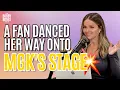 A fan posted the same dance daily until MGK pulled her on stage
