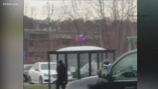 shows Naugatuck baby murder suspect being apprehended