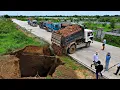 Download Lagu 5T Trucks Loading Rock And Small Dozer Pushing Filling a big sink hole