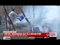 Crews neighbors battle brush fire in Shelby County