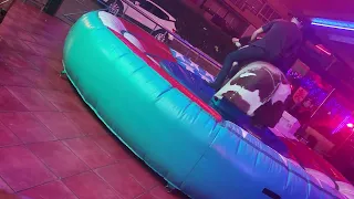 New Bull riding crazy couple riding bull