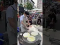 Download Lagu The process of making and selling scallion pancakes