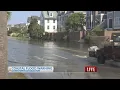 High tide floods streets in downtown Charleston