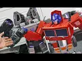 Download Lagu Robosen -Auto Transforming Megatron VS Optimus Prime
