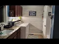 Laundry Room Makeover featuring a Shiplap Wall