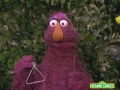 Sesame Street Telly Plays the Triangle with Big Bird