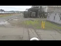 Boss says go look over the 100 ton G E and ride along to evaluate it while moving cars