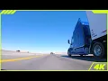 Endless Open Highway Drive with Truck Traffic Nevada Desert Under Clear Blue Sky