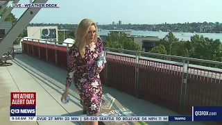 Q13 Fox anchors Liz Dueweke and Travis Mayfield play cornhole